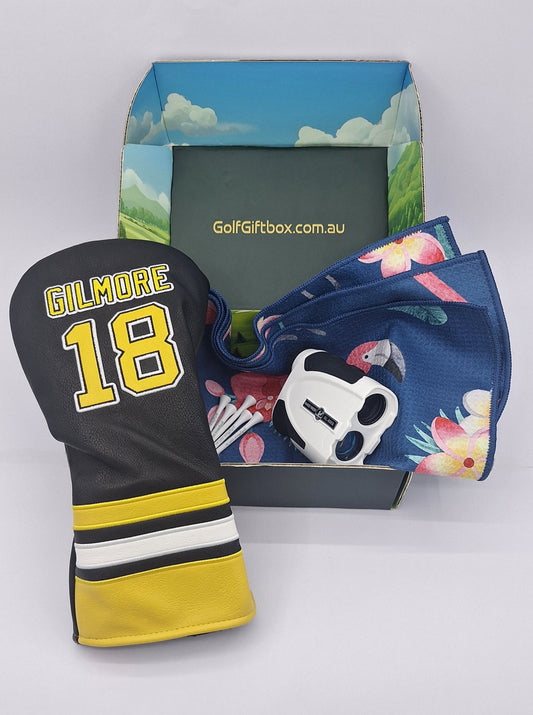 Golf gift Champions Box with rangefinder and happy gilmore club head cover and golf towel
