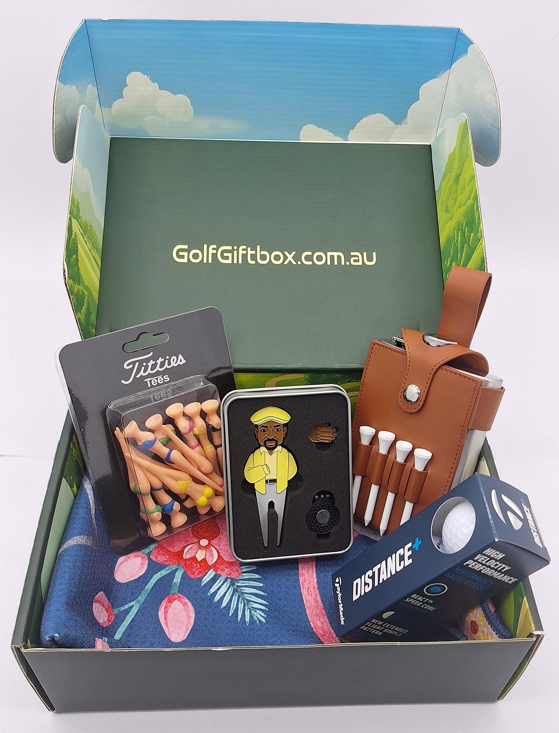 Golf gift box with Chubbs divot repair tool and ball marker and drinking flask