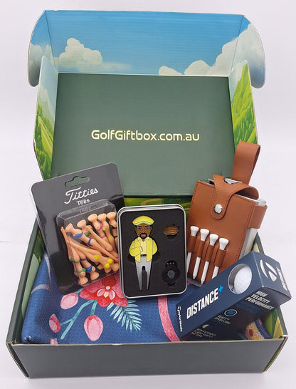 Golf gift box with Chubbs divot repair tool and ball marker and drinking flask